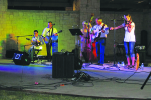 The Philip Ferguson and Texas True bluegrass band performed Saturday, September 19, 2015 at the Sachse ampitheatre. The audience enjoyed the music of Braden Paul (on mandolin), Robert Paul (on banjo), June Ferguson (on bass), Philip Ferguson (on guitar) and Hailey Sandoz (in fiddle).