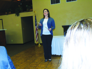 Lyndsey Rhode, insurance agent and chamber member, speaks on emergency preparedness at the February Chamber networking luncheon.