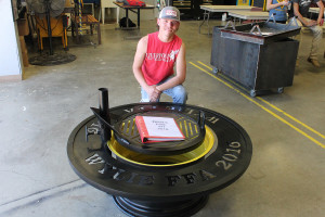 Joe Reavis/The Sachse News Wylie High School senior student Zach Vandervort of Sachse built a fire pit for the 49th annual Wylie Show and Sale that was selected as reserve grand champion shop project.