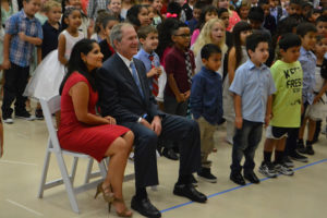 Courtesy Michael Turner/Wylie East student Former President George W. Bush and Maricela Helm, principal of George W. Bush Elementary School, pose for a picture with students at a ceremon dedicating the newest Wylie Independent School District campus.