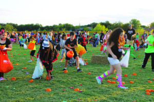 Hundreds of Halloween enthusiasts look for treats amid the pumpkins at the Pumpkin Prowl in Sachse Saturday, Oct. 15.