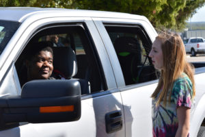 Student A.J. Bankhead is stopped in her vehicle by WEHS Criminal Justice student Sara Johnson. The student initiated stops simulated violator contact as part of a class exercise led by David Lanman.