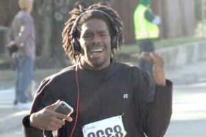 Sachse cross country runner AJ Tillman enjoyed some music as well as running during the Thanksgiving Turkey Trot. Tillman, who won the 13-18 division, finished second overall in a time of 17:24.