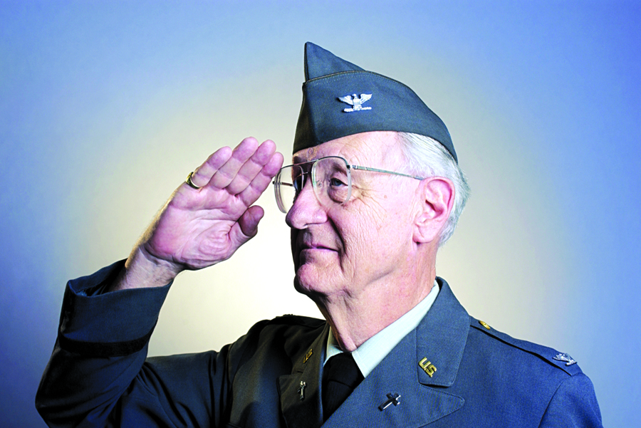 News collecting photos for Veterans Day Section