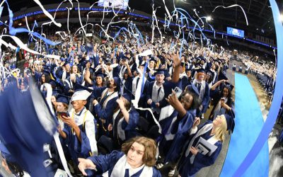 502 Wylie East graduates cross stage