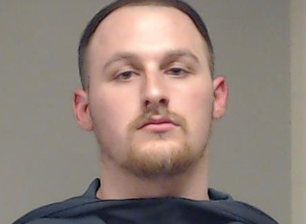 Detention officer arrested and charged for providing inmate with cell phone